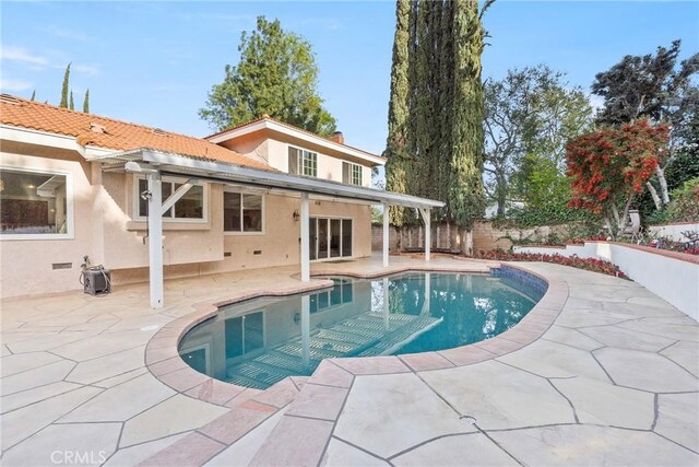 1885 Fallview Rd, Westlake Village, CA 91361 - view of swimming pool with a patio area and a fenced backyard