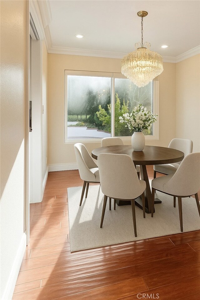 1885 Fallview Rd, Westlake Village, CA 91361 - dining space with ornamental molding, a chandelier, light wood-style flooring, and recessed lighting