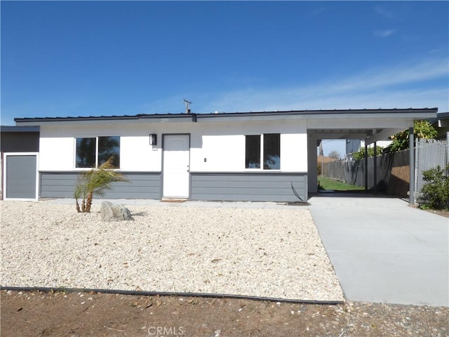 view of front of home featuring a carport