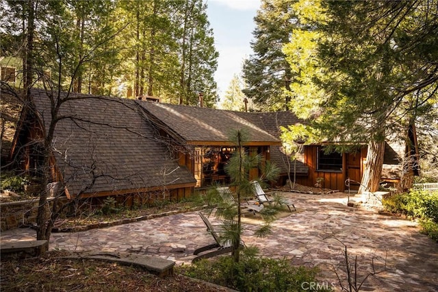 back of house featuring a patio