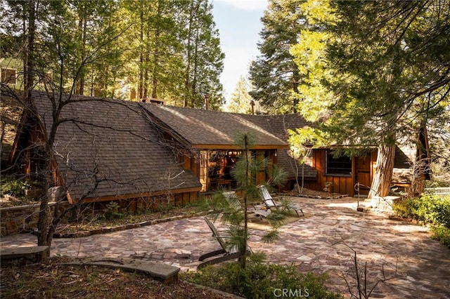 view of property's community featuring a patio