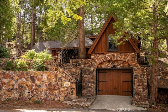 view of front of home featuring stone siding