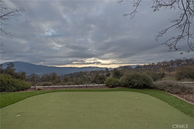 view of community with a mountain view