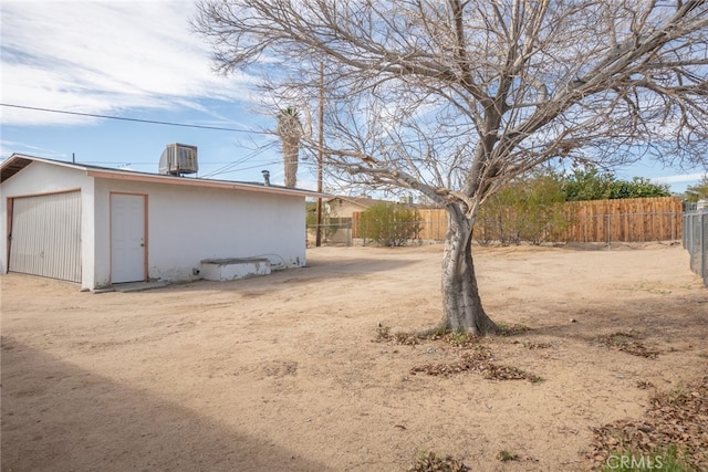 view of yard with central AC