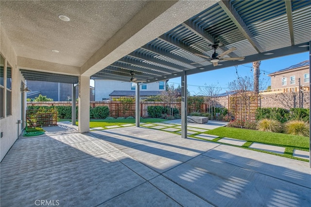 view of patio featuring a pergola and ceiling fan