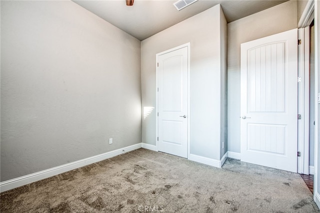 unfurnished bedroom featuring carpet floors