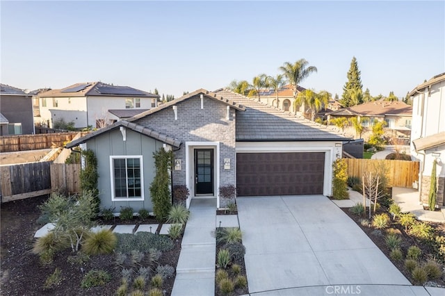 view of front of home featuring a garage