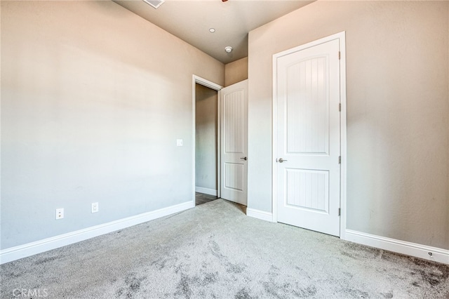 unfurnished bedroom featuring carpet floors