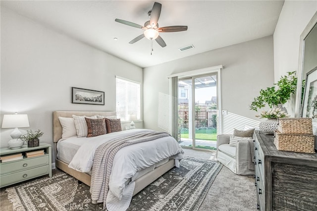 bedroom with carpet flooring, access to exterior, and ceiling fan