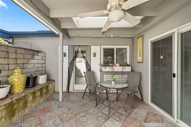 view of patio with ceiling fan