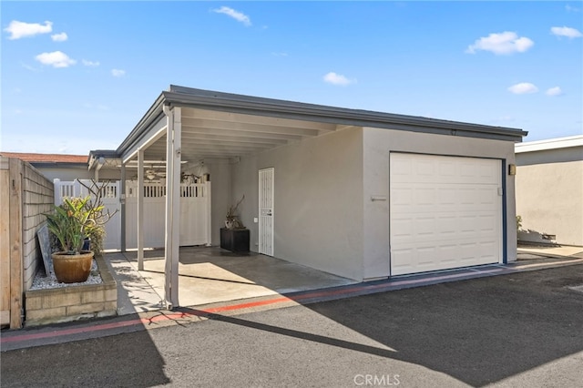 exterior space featuring a carport