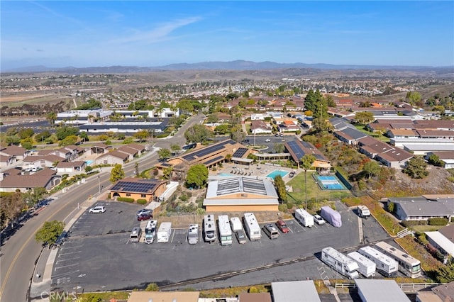 drone / aerial view featuring a mountain view