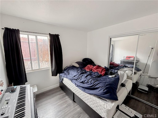 bedroom featuring wood-type flooring