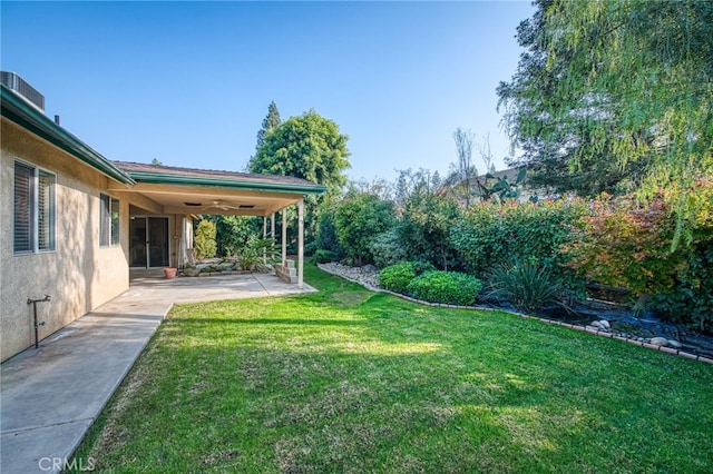 1585 W Riverglen Ave, Reedley, CA 93654 - view of yard featuring a patio area and ceiling fan