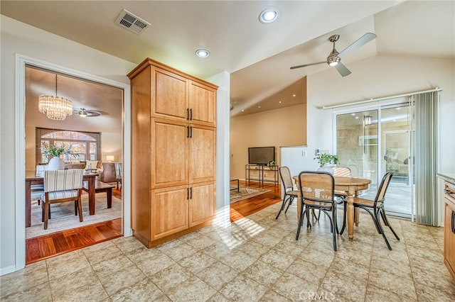 1585 W Riverglen Ave, Reedley, CA 93654 - dining room with ceiling fan with notable chandelier and vaulted ceiling