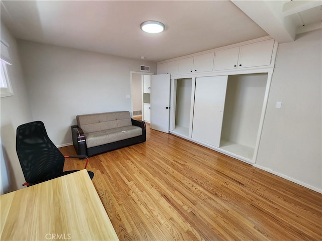 living area featuring light hardwood / wood-style flooring