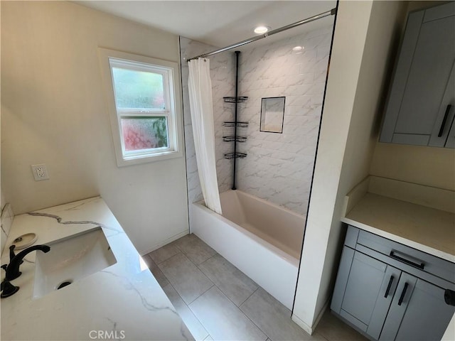 bathroom featuring vanity, tile patterned flooring, and shower / tub combo with curtain