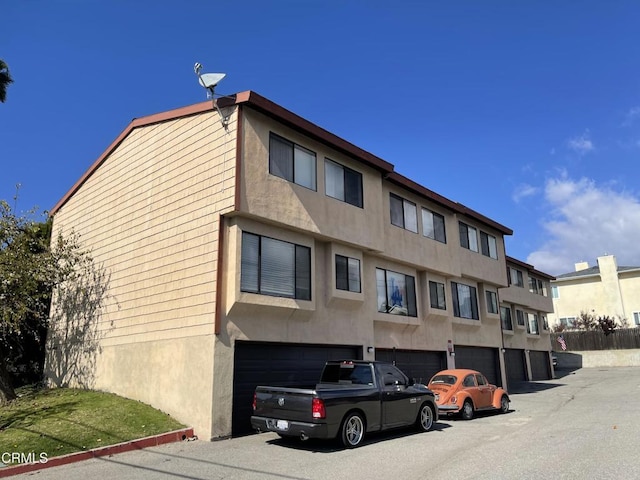 view of building exterior with a garage