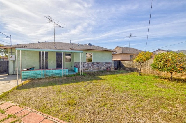 exterior space featuring a front lawn