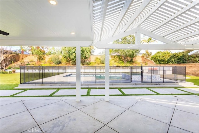 view of patio featuring fence