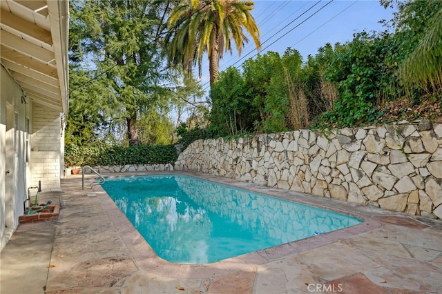 view of pool with a patio