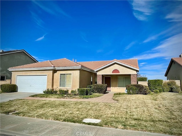 ranch-style house featuring a garage and a front yard