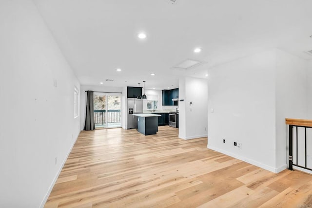 unfurnished living room featuring light hardwood / wood-style flooring