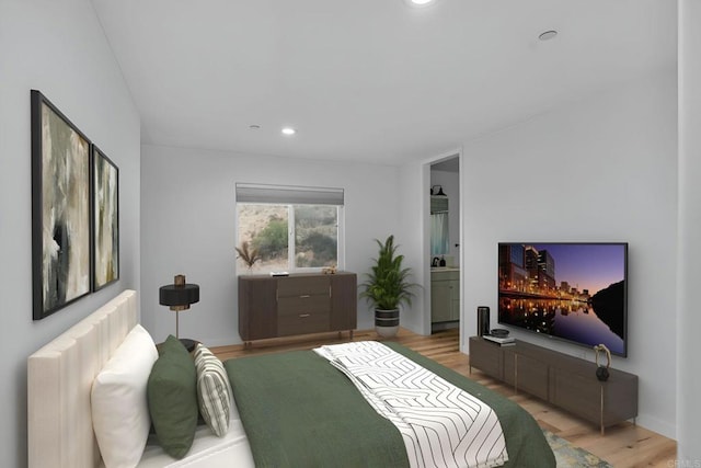 bedroom with light wood-type flooring