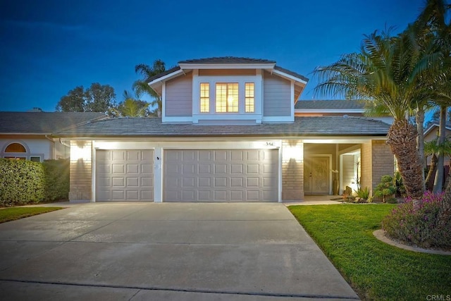 traditional home with concrete driveway