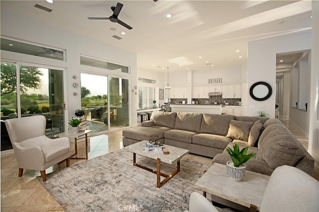 living room featuring ceiling fan