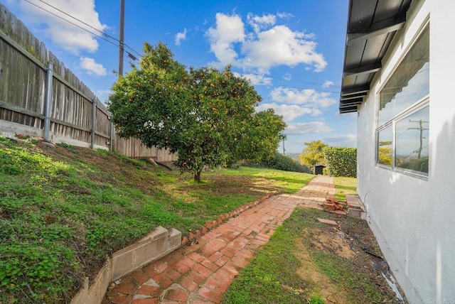 view of yard with fence