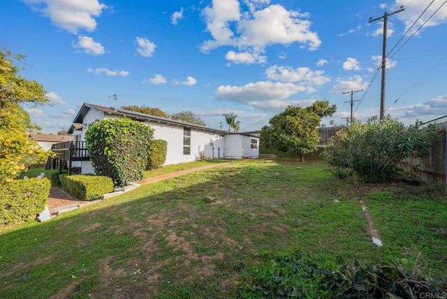 view of yard featuring fence