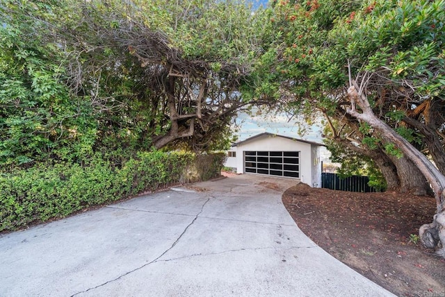 detached garage with fence