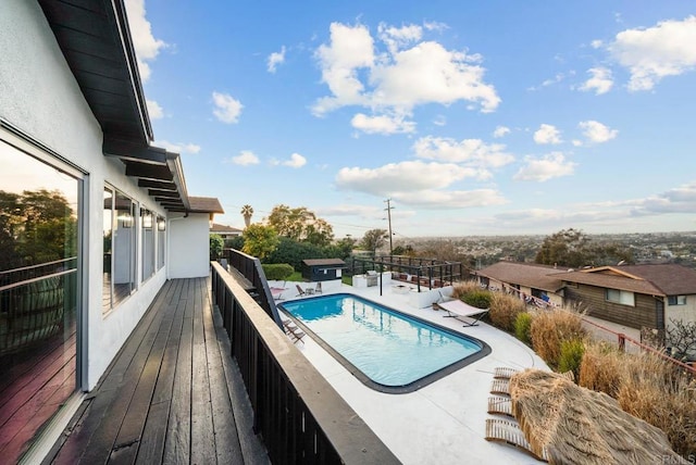 view of pool featuring a patio area and a fenced in pool