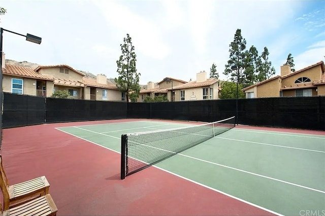 view of sport court featuring basketball court