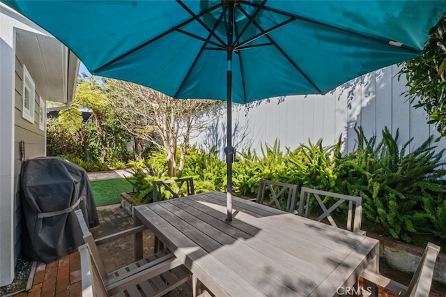 view of patio featuring outdoor dining area and area for grilling