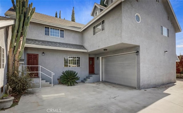 view of front of home featuring a garage