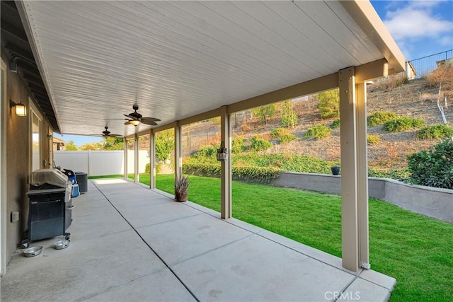 view of patio featuring a grill and ceiling fan