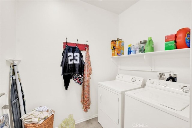 laundry room with independent washer and dryer