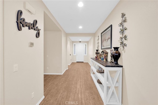 hallway featuring light hardwood / wood-style floors