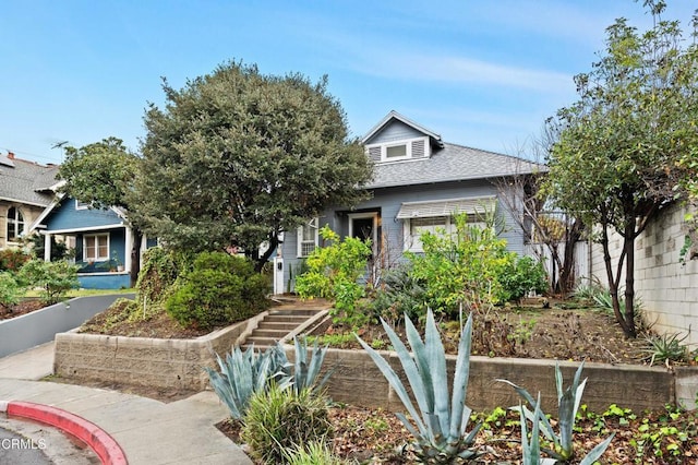 view of property hidden behind natural elements