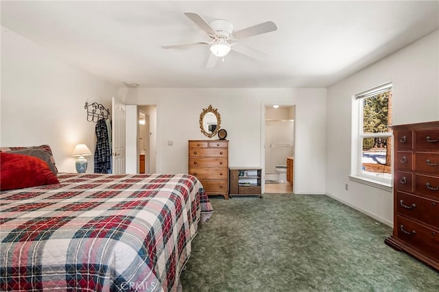 carpeted bedroom with ceiling fan, baseboards, and ensuite bath