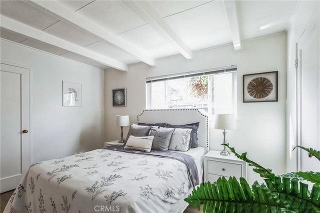 bedroom with beamed ceiling