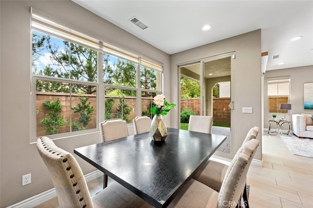 dining area with recessed lighting, visible vents, and baseboards