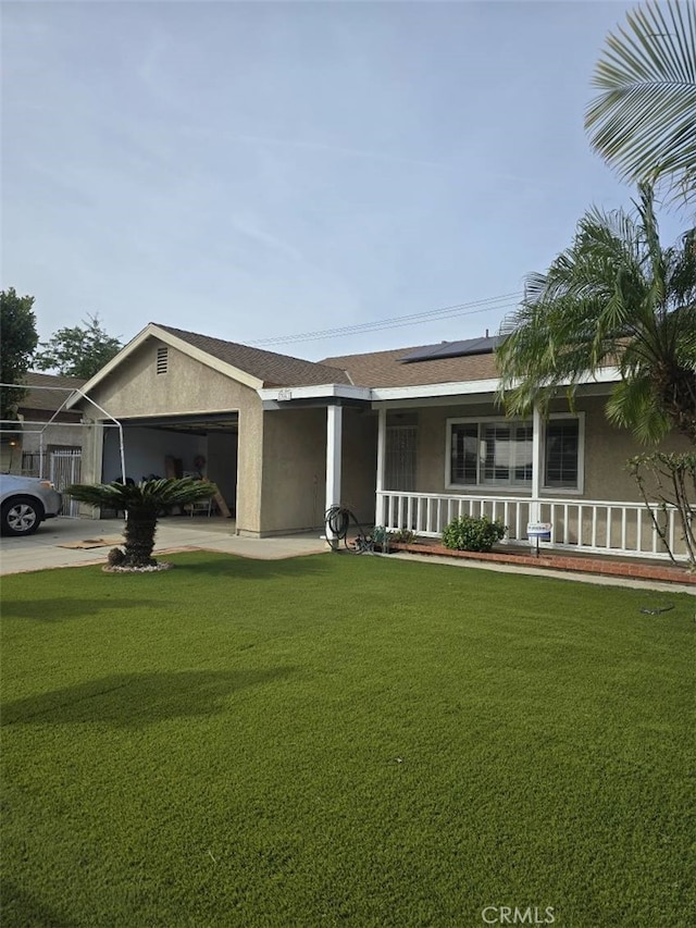 ranch-style home with a garage, a porch, and a front yard