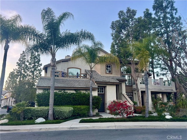 view of front facade featuring stucco siding