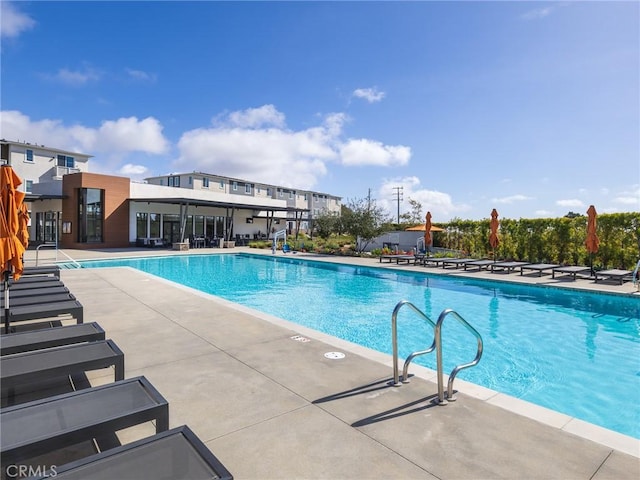 community pool featuring a patio