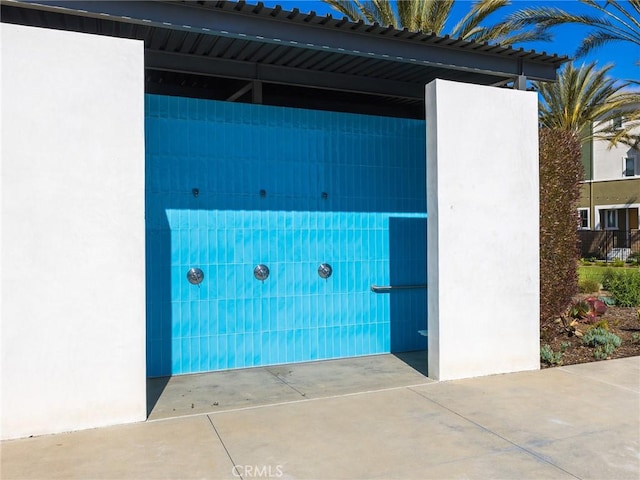 exterior space with stucco siding