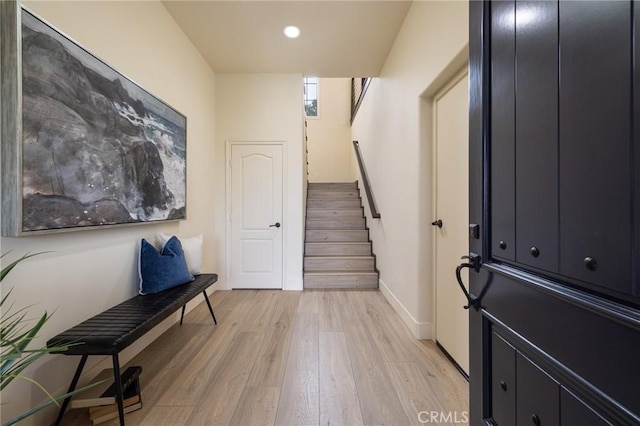 foyer entrance featuring light wood-type flooring