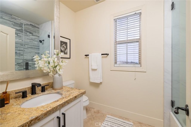 full bathroom with bath / shower combo with glass door, vanity, and toilet